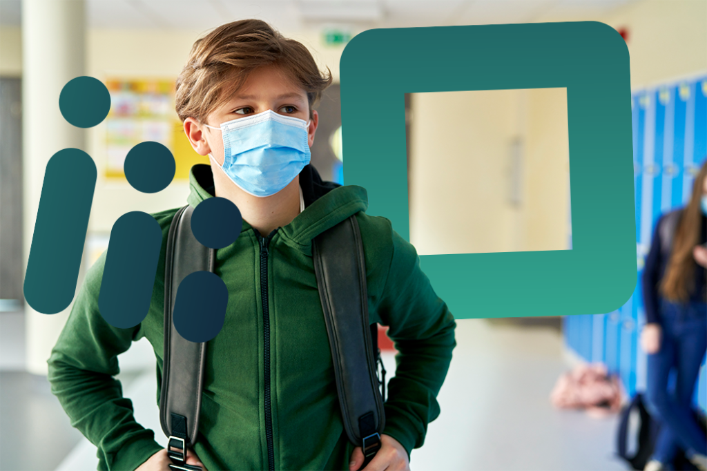 a student in a school wearing a mask.